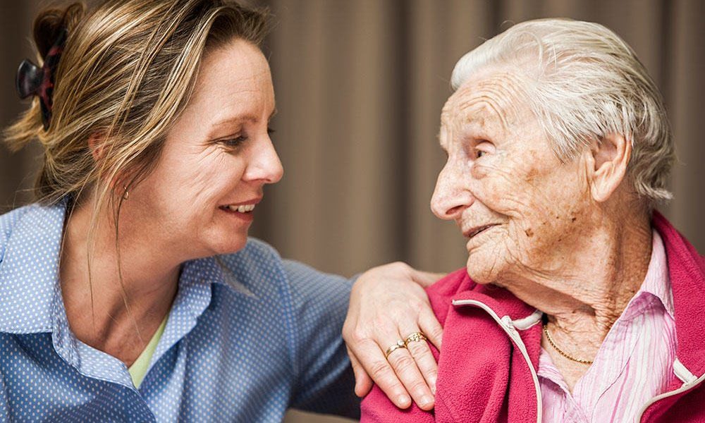 A carer with the resident