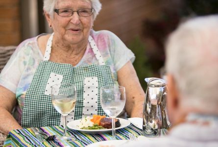 A group of Whiddon residents enjoying lunch together at Whiddon Hornsby's aged care home.