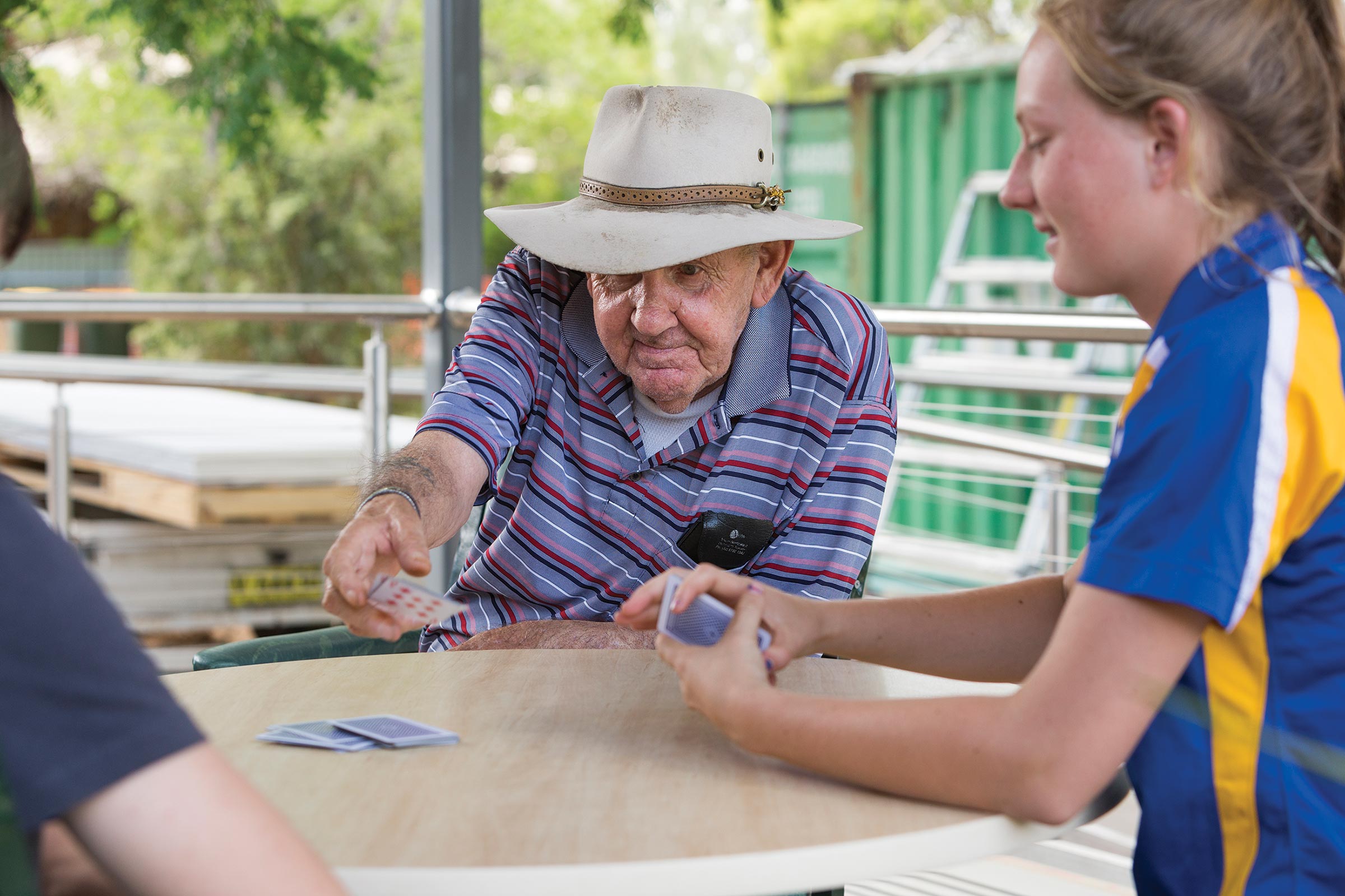 Whiddon resident playing cards at an aged care home in Beaudesert.